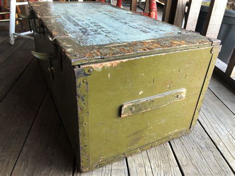 100 pound marked military wooden box trunk with metal bracing|military storage boxes.